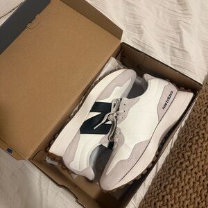 New Balance White and Black Sneakers for Versatile Style